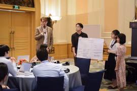 Các cán bộ, giảng viên tham gia hoạt động tại chương trình tập huấn. (Ảnh: PV/Vietnam+)