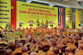 Ban trị sự Giáo hội Phật giáo Thành phố Hồ Chí Minh) tổ chức Lễ míttinh kỷ niệm 35 năm Ngày thành lập Giáo hội Phật giáo Việt Nam. (Ảnh: Thế Anh/TXVN)