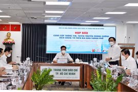 Họp báo thông tin phòng, chống dịch trên địa bàn Thành phố Hồ Chí Minh ngày 15/11. (Ảnh: Xuân Anh/TTXVN)