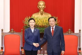 Trưởng Ban Nội chính Trung ương Phan Đình Trạc tiếp Bộ trưởng Tư pháp Trung Quốc Hạ Vinh đang thăm và làm việc tại Việt Nam. (Ảnh: Phương Hoa/TTXVN)