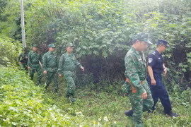 Bộ đội Biên phòng Lai Châu (Việt Nam) tuần tra liên hợp chấp pháp biên giới tháng 9 với Chi đội Quản lý Biên giới Hồng Hà, Trạm kiểm tra Biên phòng xuất, nhập cảnh Kim Thủy Hà (Trung Quốc). (Ảnh: TTXVN phát)