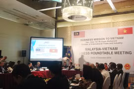 Hội nghị bàn tròn giữa các lãnh đạo doanh nghiệp Việt Nam – Malaysia, ngày 8/12. (Ảnh: PV/Vietnam+)