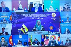 Cờ ASEAN và cờ Timor Leste. (Nguồn: newsbeezer.com)