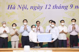 Thủ tướng Chính phủ Phạm Minh Chính phát động Chương trình “Sóng và máy tính cho em” ngày 12/9. (Ảnh: Dương Giang/TTXVN)