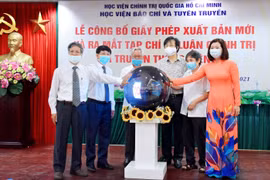 Lễ ra mắt Tạp chí Lý luận chính trị và Truyền thông điện tử. (Ảnh: Mai Nghiêm/Vietnam+)