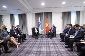 Thủ tướng Phạm Minh Chính tiếp Tổ chức Hợp tác và Phát triển kinh tế (OECD) Mathias Cormann. (Ảnh: Dương Giang/TTXVN)