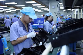 Công ty TNHH Công nghiệp chính xác EVA, vốn đầu tư của Hồng Kông (Trung Quốc) tại khu công nghiệp, đô thị VSIP Hải Phòng, chuyên sản xuất linh kiện điện tử cho máy văn phòng. (Ảnh: Danh Lam/TTXVN)