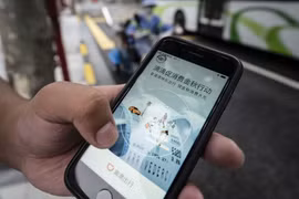 Ứng dụng đặt xe của Didi Global Inc trên điện thoại tại Trung Quốc. (Nguồn: Blooberg)