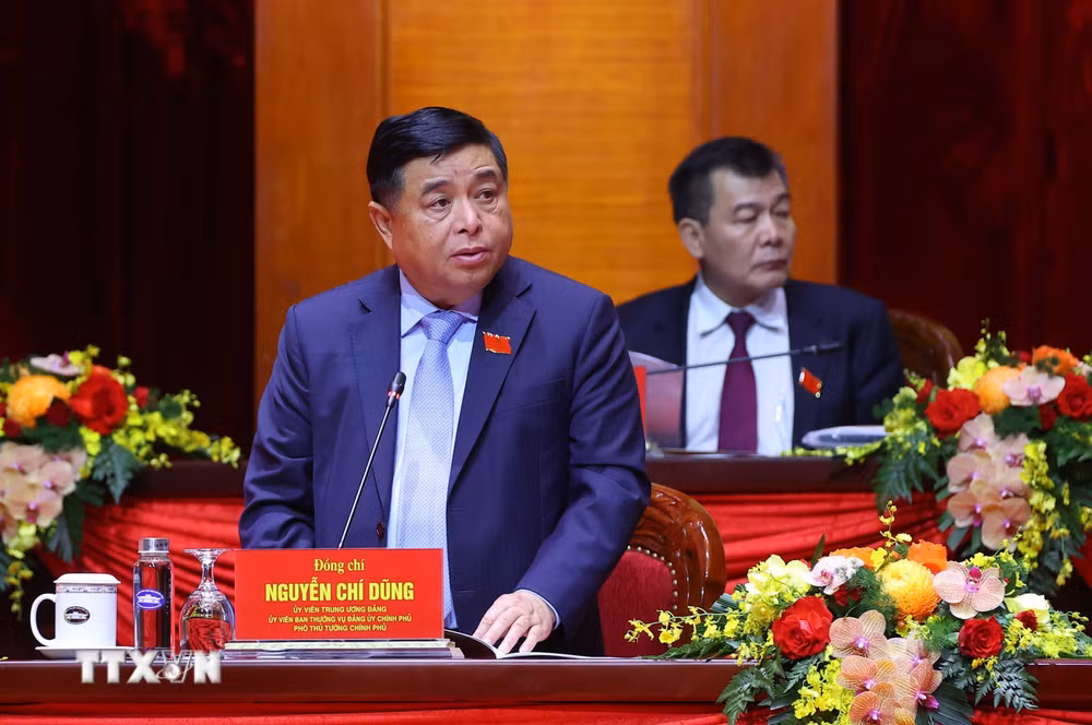 ttxvn-dai-hoi-dai-bieu-dang-bo-chinh-phu-lan-thu-nhat-cac-dai-bieu-tham-luan-tai-hoi-truong8.jpg