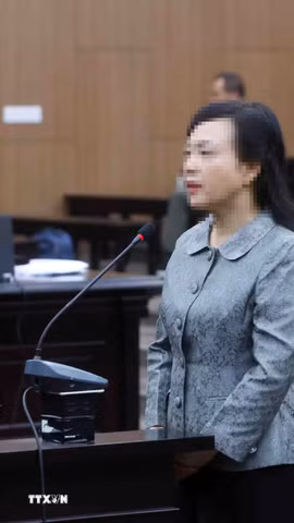 Bị cáo Nguyễn Thị Kim Tiến, cựu Bộ trưởng Bộ Y tế khai báo trước tòa. (Ảnh: Phạm Kiên/TTXVN)