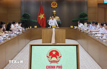 Phó Thủ tướng Lê Tiến Châu, Phó Trưởng Ban Thường trực Ban Chỉ đạo tổng rà soát hệ thống Văn bản quy phạm pháp luật chủ trì cuộc họp. (Ảnh: Lâm Khánh/TTXVN)