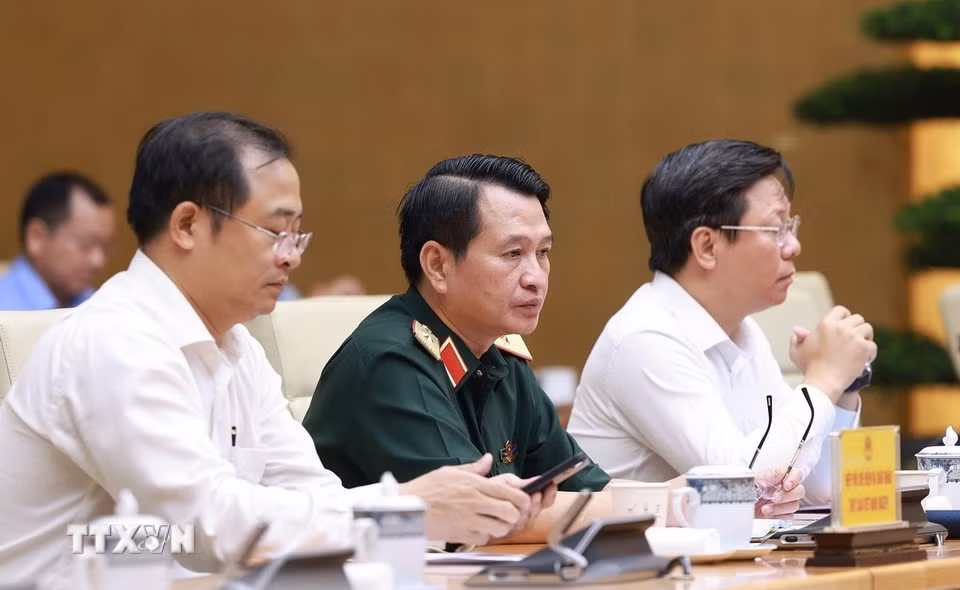Đại diện các bộ, ngành tham dự Phiên họp lần thứ 14 của Ban Chỉ đạo Quốc gia về chống khai thác hải sản bất hợp pháp. (Ảnh: Dương Giang/TTXVN)