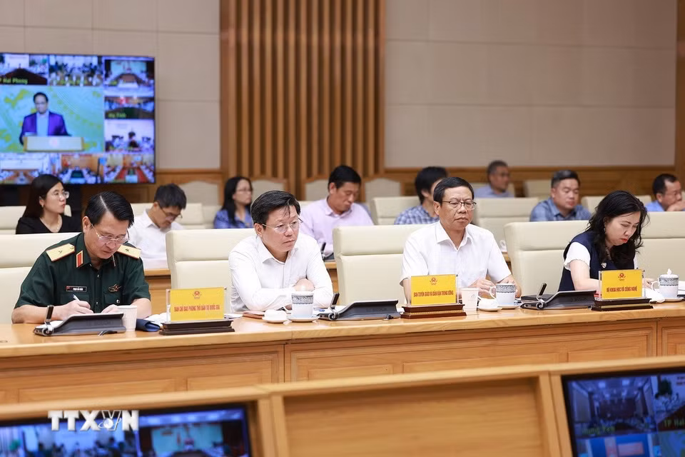 Đại diện các bộ, ngành tham dự Phiên họp lần thứ 14 của Ban Chỉ đạo Quốc gia về chống khai thác hải sản bất hợp pháp. (Ảnh: Dương Giang/TTXVN)