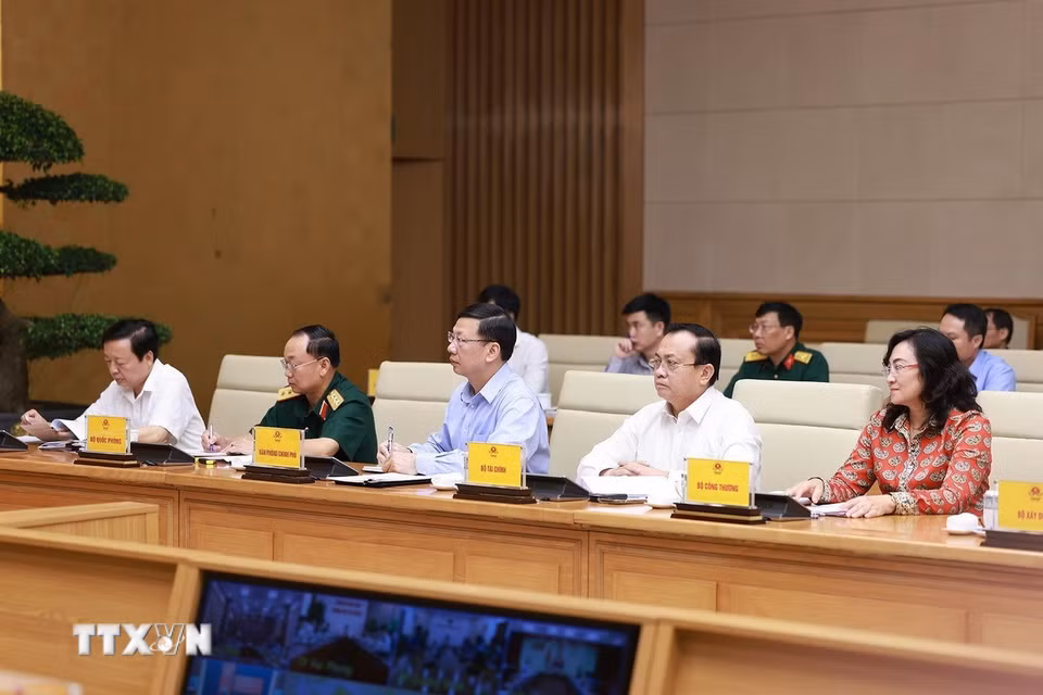Đại diện các bộ, ngành tham dự Phiên họp lần thứ 14 của Ban Chỉ đạo Quốc gia về chống khai thác hải sản bất hợp pháp. (Ảnh: Dương Giang/TTXVN)