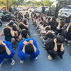 Các đối tượng vi phạm bị bắt giữ tại Cơ quan Công an Thành phố Hồ Chí Minh. (Ảnh: CA Thành phố Hồ Chí Minh cung cấp)
