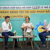 Các chuyên gia trao đổi, thảo luận về giải pháp chủ động phòng ngừa bệnh hô hấp ở trẻ nhỏ. (Ảnh: PV/Vietnam+)