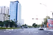 Đoạn từ đường La Thành, lối xuống đường Vành đai 1 (đối diện Bệnh viện Phụ sản Hà Nội) đã hoàn tất phần nền. (Ảnh: Quốc Khánh/TTXVN)